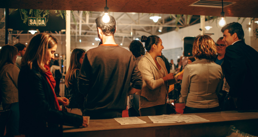 Photo of people having drinks in the evening