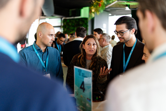 Group of people talking at a networking event