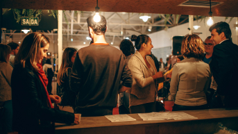 Photo of people having drinks in the evening