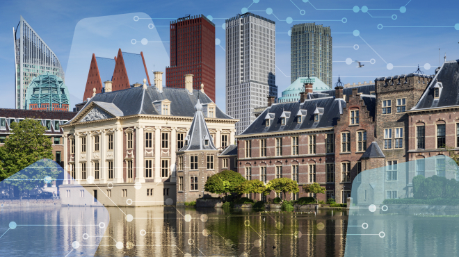 Hofvijver with the Binnenhof, modern buildings in the background.