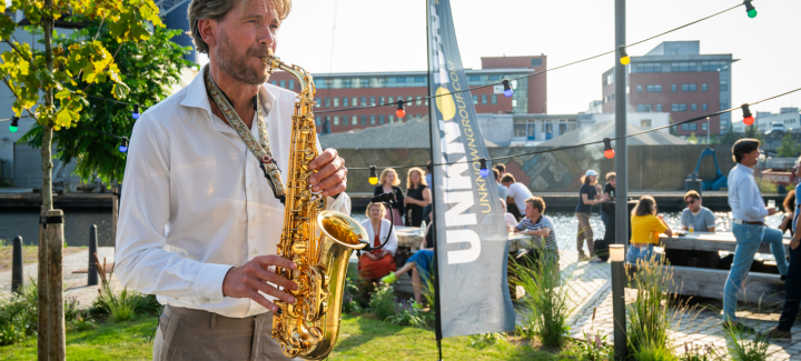 Playing Saxophone outside Titaan
