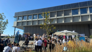 People gathering outside titaan