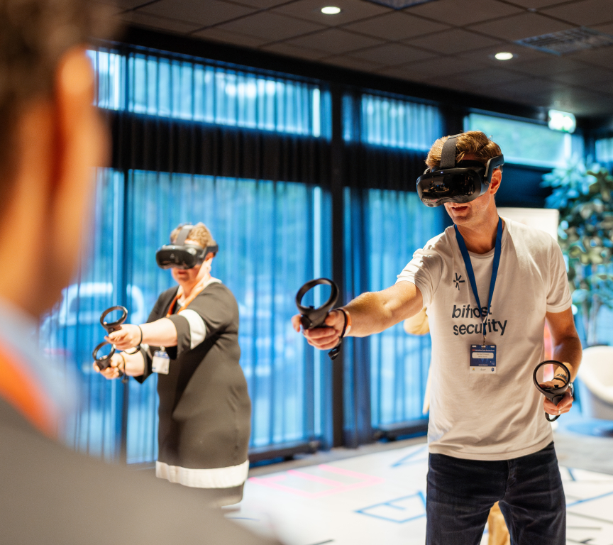 Image two people with VR glasses playing VR game.