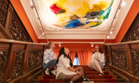 Mauritshuis with participants sitting on stairs