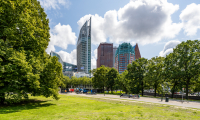 Image of the skyline of The Hague with a green park
