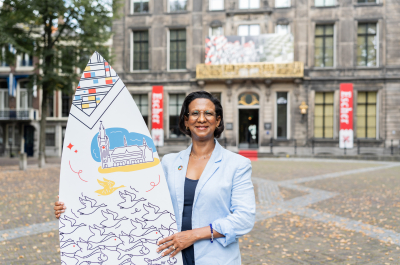 Advisor Jeanine with Surfboard