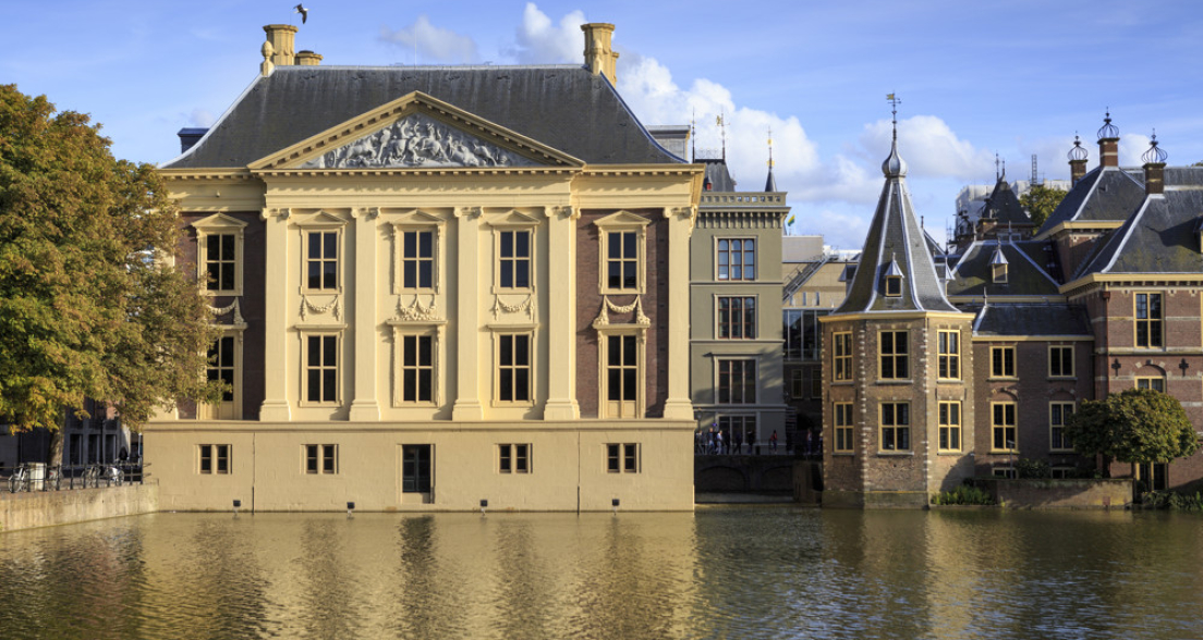 Facades of buildings by the Hofvijver in The Hague.