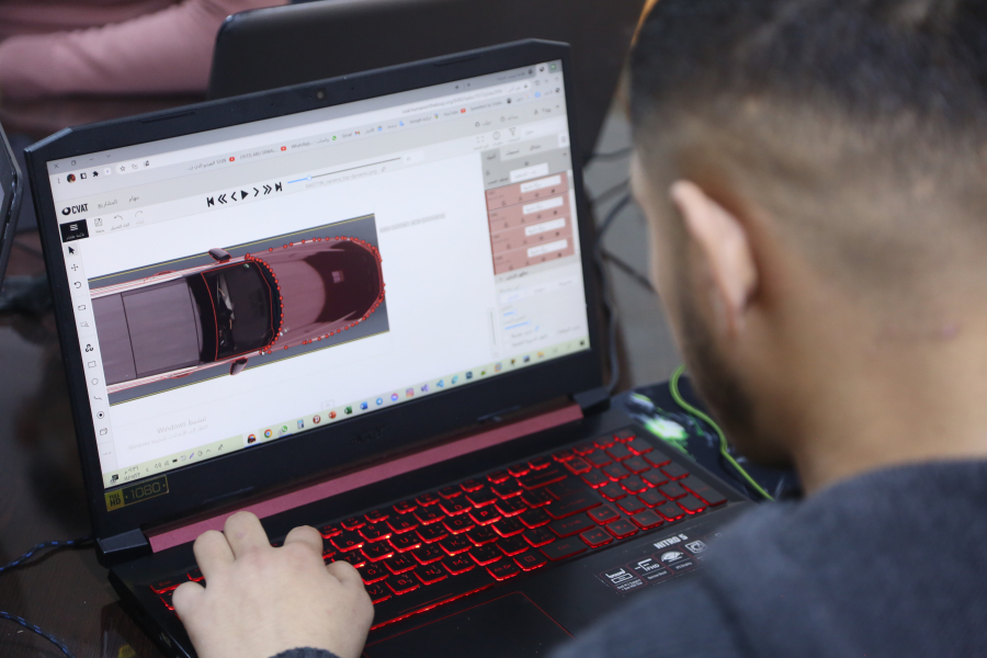 A man working behind his computer 