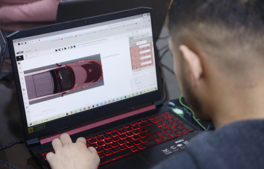 A man working behind his computer 