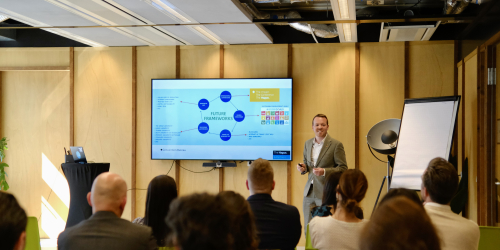 Image of Stuart Payne giving a presentation about Legal and Policy in The Hague