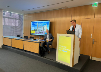 Image of 2 people at the whitepaper press release