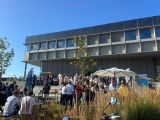 People gathering outside titaan