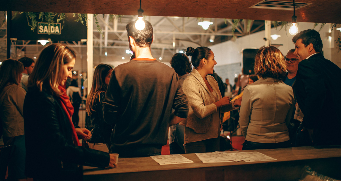 Photo of people having drinks in the evening