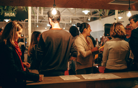 Photo of people having drinks in the evening