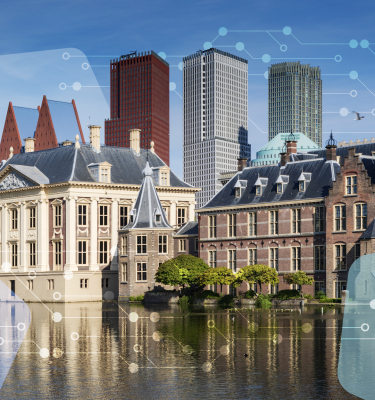 Hofvijver with the Binnenhof, modern buildings in the background.