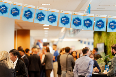 Attendees mingling at Cybersecurity Week in The Hague.