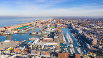 Aerial view of Scheveningen harbor with yachts and beach