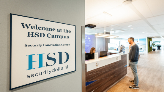 Image of HSD Campus interior with their logo on wall