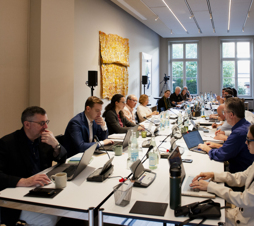 III Europe multiple people around a table.jpg