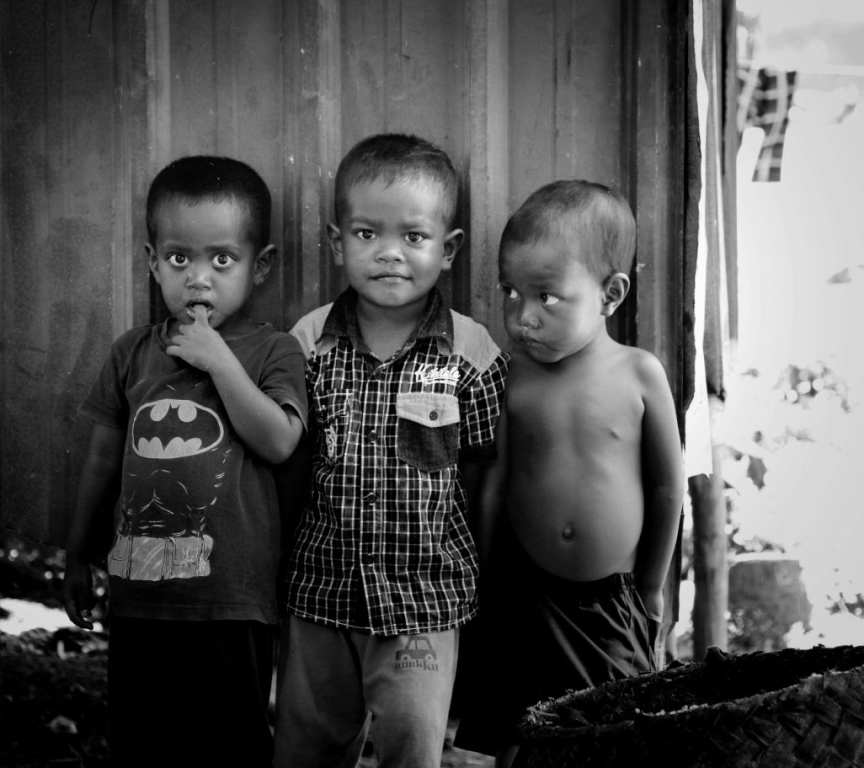 Unsplash Edmund Lou 2-boys-standing-near-wooden-door