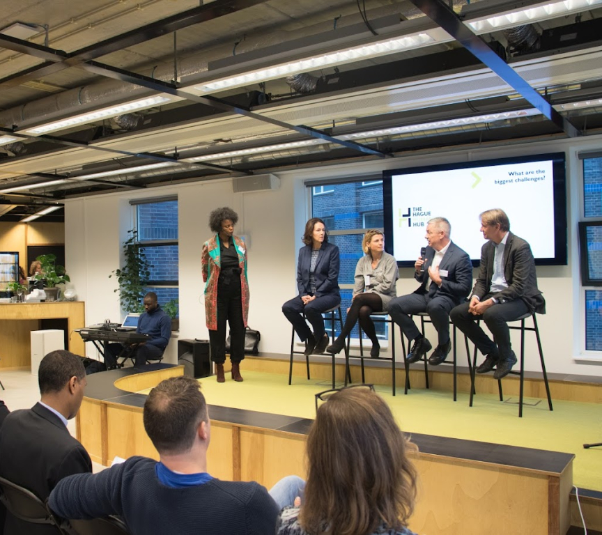 a panel discussion at an event at The Hague Humanity Hub