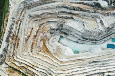 Aerial view of a mining landscape with water pools.