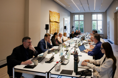 III Europe multiple people around a table.jpg