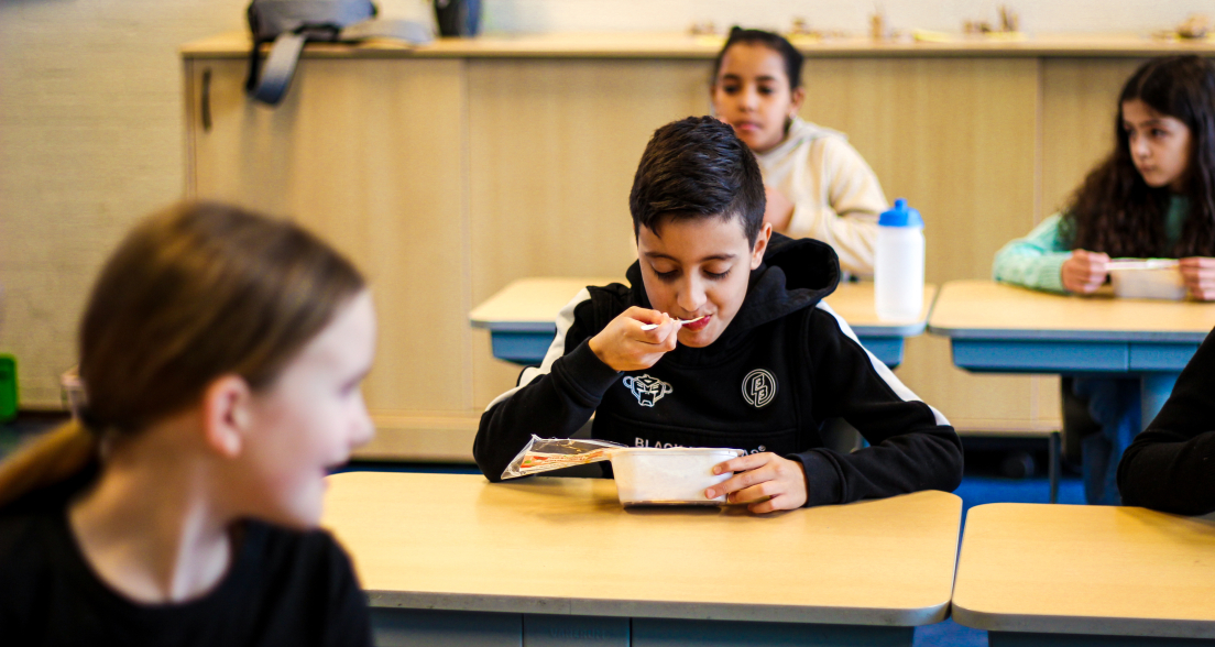 Children having healthy food source TommyTomato