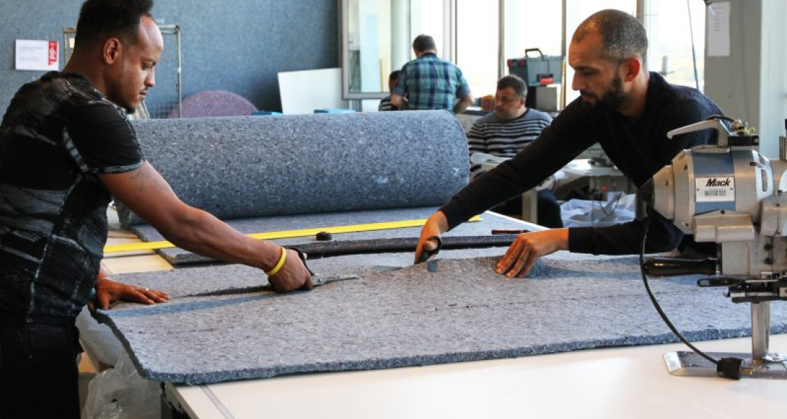 people at work at i-did, a company in The Hague with a social and sustainable mission