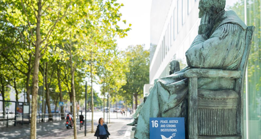 The Hague Supreme Court and a sign depicting SDG 16