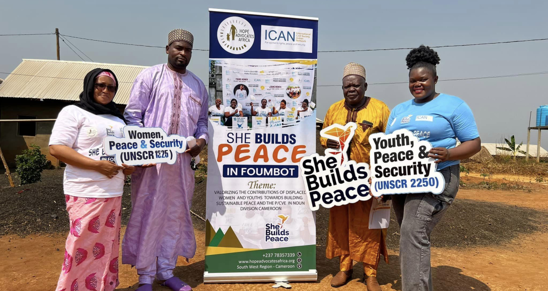 Group of people holding signs for peace and security ICAN