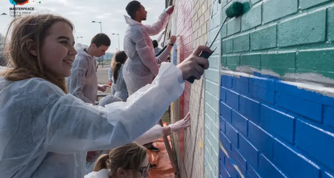 Young peeople working on murals source MasterPeace