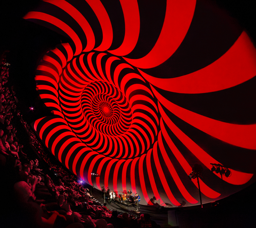 Hypnotiserend roterend patroon in rood en zwart